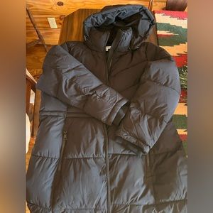 Calvin Klein XL puffer coat. Mid length. Black. Brand new. Super nice.
